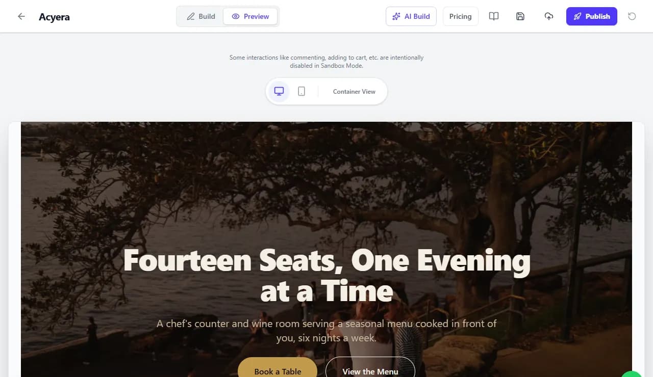 The Preview tab of the Acyera editor, showing a restaurant page as a visitor would see it, with desktop and phone view buttons